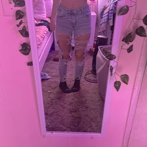 Light blue ripped American eagle skinny jeans